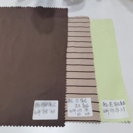 PES: Nylon: filato composito Spandex